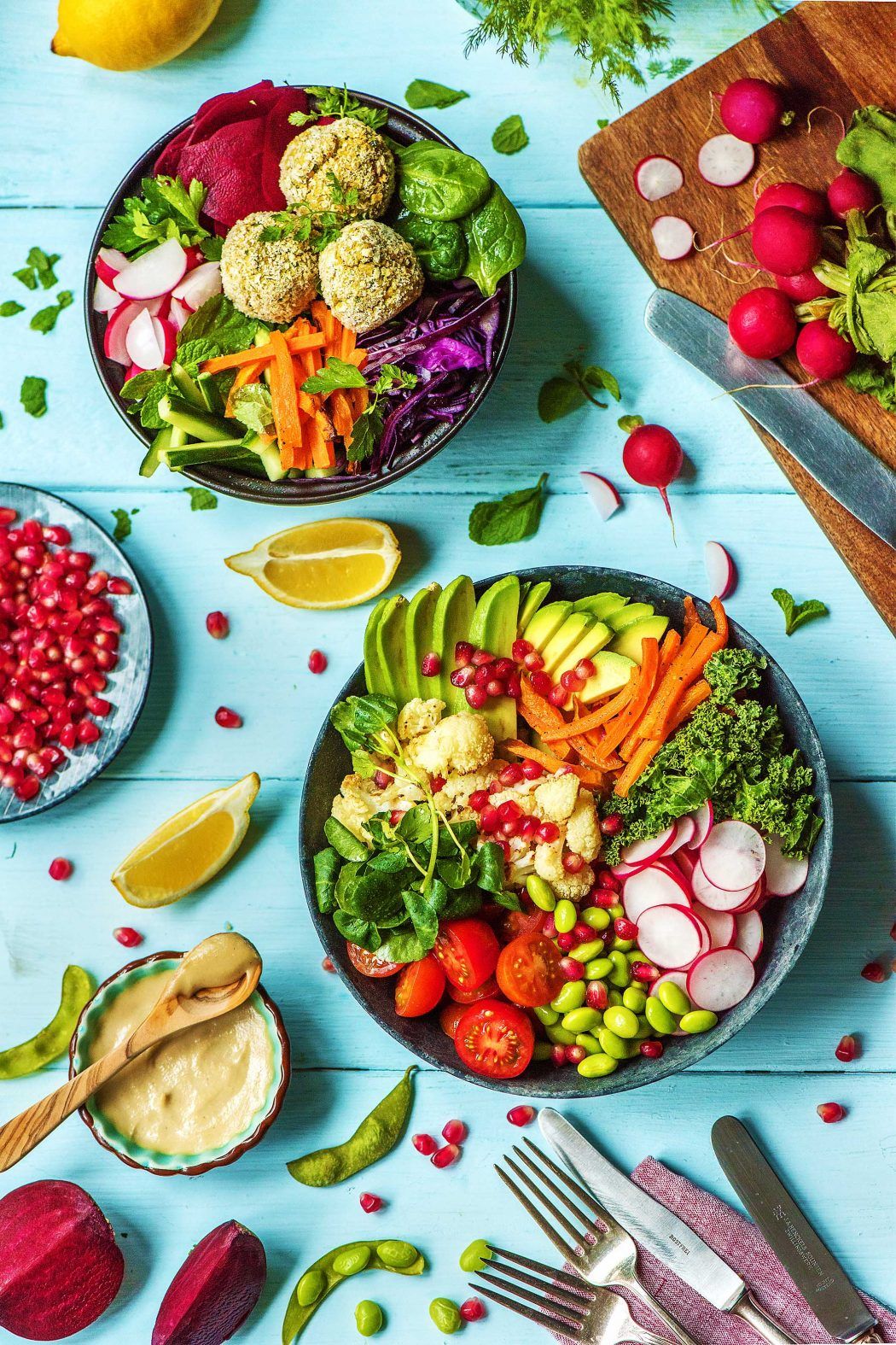 Colorful flat lay of assorted tropical fruits including pineapple, berries, and citrus.